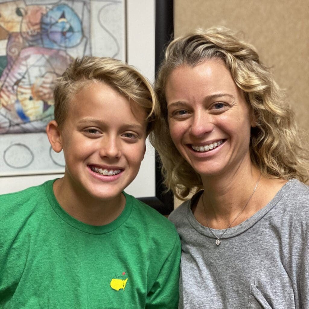 A picture of a mom and son wearing braces from Dr. Roeder in Asheville, NC