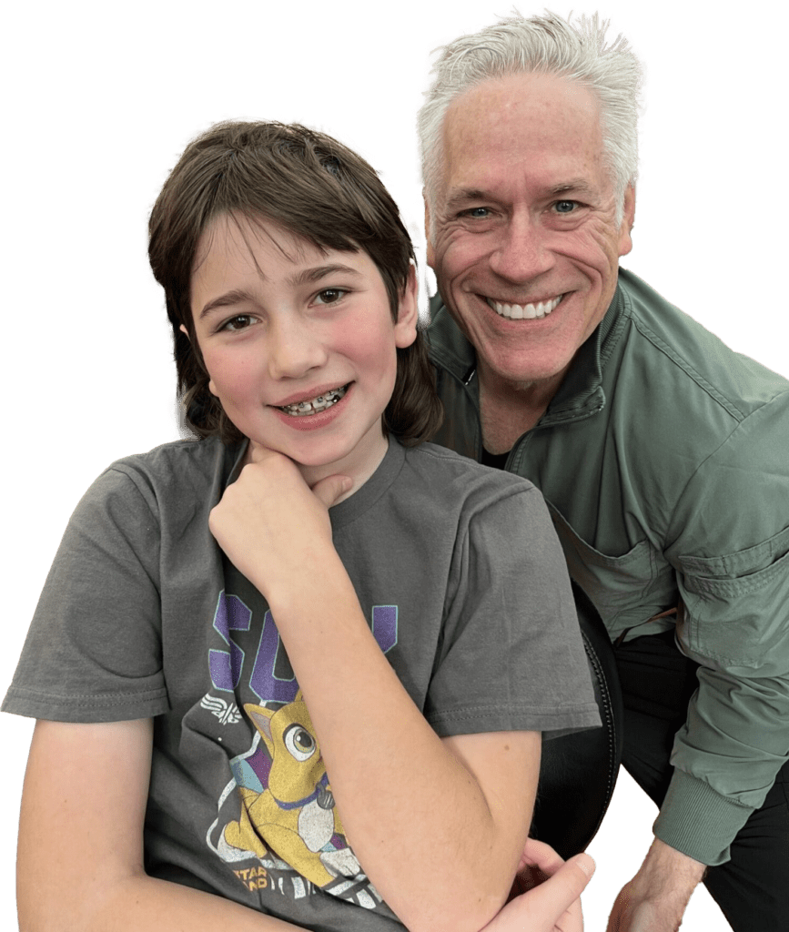 a picture of dr. roeder with a male patient wearing braces